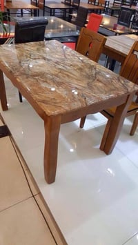 طاولة طعام • خشب ومرمر • البصرة