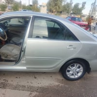 سيارة كامري 2002بيه تبديل قطع رقم بغداد مشروع وطني السعر75وبيه مجال ات...