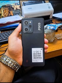 بوكو X5 برو 5G • ذاكرة ٢٥٦ • كارتون+شاحن ٣٣واط+سماعات