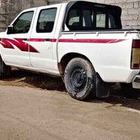 بيكم نيسان موديل 2002 محرك 1400 كابريتر اسود  بيه صرف رقم واسط سنويه 2...