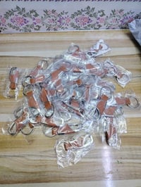 ميداليات مفاتيح • جلدي ومعدني • ٤٠ قطعة