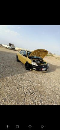 لانسر صفراء • ٢٠٠٩ • محرك ٢٠٠٠