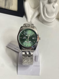 ساعة أورينت • بليبل • مزاد