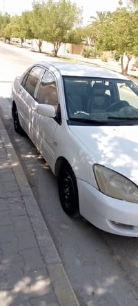 لانسر موديل ٢٠٠٦حادثةجاملغ خلفي مصبوغه حزام محرك ١٦٠٠ السعر٦٧ للستفسار...