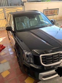 كيا تولرايد 2025 لون اسود ملكي رقم بغداد عداد المسافه15 فئه ال S الحاد...