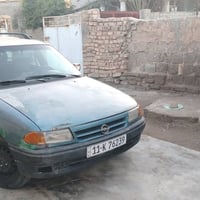 اوبل استرا موديل 93 بأسمي رقم بغداد دولي سياره بلاديه بس جارده مكينه 1...