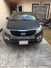 سبورتج 2015 باسمي  ماشيه 170 الف  سعر 13200$ للتواصل 07713900594