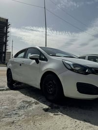 ريو ١٫٦ • مكينة وكيّر بالكرتون • داخل نظيف