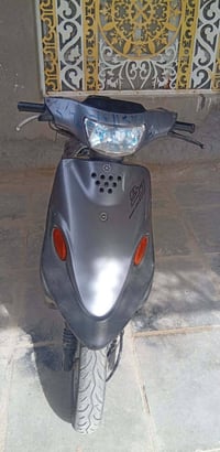 دراجة بيجي • محرك ياباني • شاصي مكفول