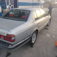 BMW 735رقم بغداد انكليزي غرفه جلد سياره جاهزه  07829188525