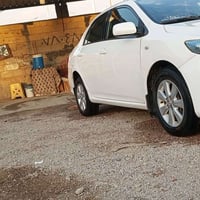 كورلا ٢٠١١ • محرك ١٨٠٠ • ضرر باب خلفي