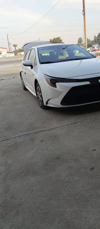 كورلا هايبرد للبيع  موديل 21 ماشيه 54 بغداد بسمي رقم انكليزي  تبديل با...