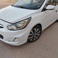 اكسنت • ٢٠١٥ • رقم بغداد