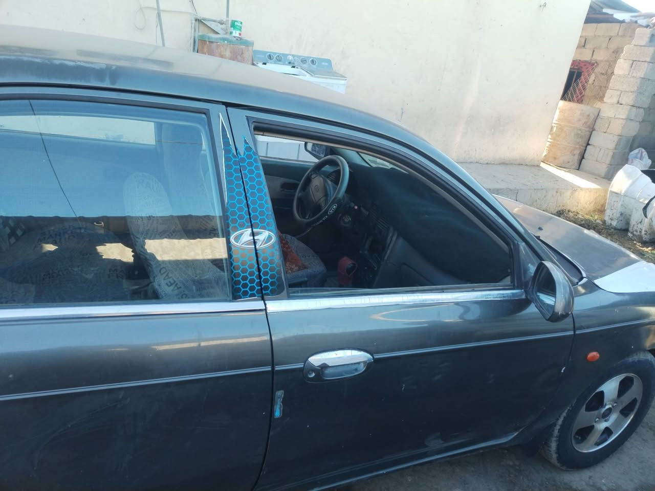 سيارة سبكترا 2003 مكفوله من كلشي كير محرك خير من الله رقم بغداد/***********
