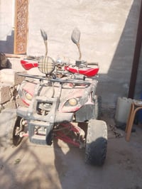 دراجه رباعي زيرو بانزين السعر 800بيه مجال الضلوعيه07810989262