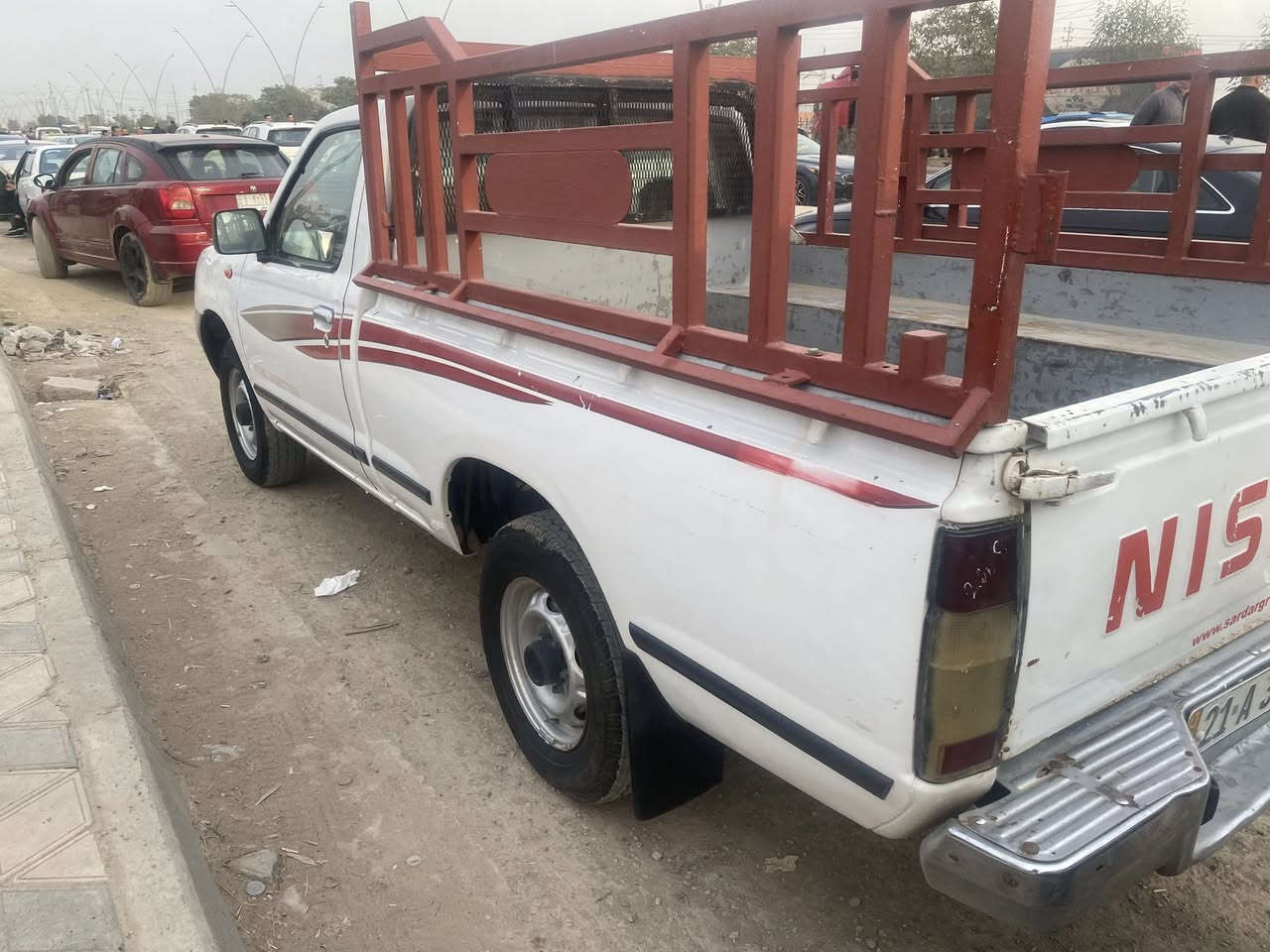 سلام عليكم بيكم نيسان للبيع تبريد ثلج ❄️ تدفئه دوشمه جديده سنويه 28 اليساره بسمي ثاني يوم تحويل جام كهرباء كله شغال اشاير سكن لايت كله شغال ربع دينار مذب عليها 
بيها الباب اليوره صبغ والبدي من الداخل اني صابغه حته ميزنجر ابد السيارة السعر  98 وبيها مجال السياره خير من الله تاخذ بيها تراي وين متريد مكاني ديالى بعقوبه هذا رقمي ***********
