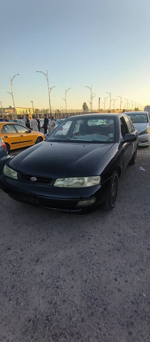 كيا سيفيا 1994 كير عادي النظافة بعد انظف من الصور والفيديو محرك لا تبخير ولا ينقص السعر 30 وبيه مجال بسيط رقم وسنوية باجر استلمهن رقمه الانبار  رقم التواصل ***********
