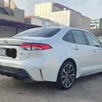 Toyota corrola 2022 se           بۆفرۆشتن  تەنها یەک چامڵخی لای دواوەی...