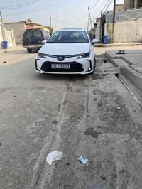 كورلا 2025 هايبرد الشكل الخليجي زيرو ماشية4 الف رقم بغداد الدولي بأسمي...