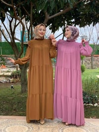 شروة فساتين وعبايات • ٤٥٠ قطعة