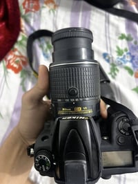 نيكون ٧٠٠٠D • عدسة ٥٥-٢٠٠ • نضيفة