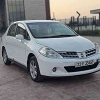 تيدا ٢٠١٠ • اوتوماتيك • فول مواصفات