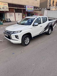 مسيوبيشي بيكب L200 فورل ويل بانزين كير عادي  2023 فول مواصفات  مكفوله ...