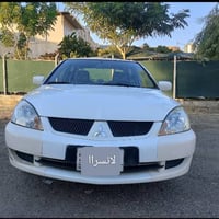 لانسر 11 • محرك 1500 • بدون صبغ