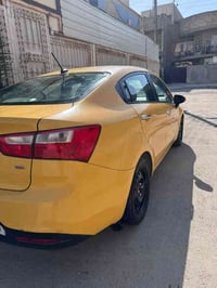 كيا ريو بغداد 2014 امريكي حادثها الجاملغ الايمن ونفس معمر السياره ليبل...