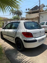 سعرها 50 وبيها مجال  حق الجية سيارة بيجو 307.2006 رقم بغداد الكير: أوت...