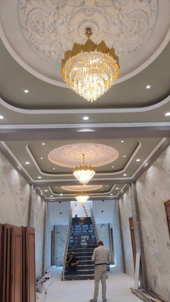 ​👷‍♂️ كادر كهربائي محترف.. مستعدون لتلبية طلباتكم فوراً 👷‍♂️
هل تبحث عن الدقة، السرعة، والاحترافية في التنفيذ؟ كادرنا متفرغ وجاهز تماماً لاستلام مشاريعكم الهندسية والإنشائية بكافة الأحجام.

​📌 أبرز تخصصاتنا ومجالات عملنا:

​التأسيسات الكهربائية المتكاملة: تنفيذ شبكات الإنارة والطاقة للمنازل، الفنادق، المولات، القاعات، والمجمعات السكنية والتجارية.

​قراءة المخططات الهندسية: قراءة أدق المخططات الكهربائية والتنفيذ الفوري على أرض الواقع بأعلى معايير السلامة والجودة.

​تمديد وتسليك الكيبلات: تركيب حاملات الكيبلات (Tray Cable) بكافة الأحجام، وسحب وتسليك الكيبلات ذات القدرات العالية.

​لوحات السيطرة والتوزيع: تجميع وتأسيس لوحات التوزيع الرئيسية والفرعية، وربط منظومات التشغيل الذاتي والتحويل الفوقي (ATS).

​المنظومات الذكية والتيار الخفيف: تنصيب كاميرات المراقبة، ربط منظومات الحريق والإنذار المبكر، وتأسيس شبكات الإنترنت والإنارة الذكية.

​الحلول الهندسية والصيانة: فحص الأحمال، موازنة الأطوار (3-Phase)، ومعالجة المشاكل الكهربائية المعقدة بدقة واحترافية.

​منظومات الحماية: تأسيس شبكات التأريض والمؤريضات لحماية الأجهزة والمباني من الصواعق والتماس الكهربائي.

​💡 لماذا تختار كادرنا؟

​⏳ الالتزام المطلق: دقة متناهية في مواعيد التسليم والالتزام بجدول العمل.

​🛠️ خبرة عريقة: نمتلك خبرة عملية تمتد لـ 15 سنة في سوق العمل العراقي.

​📋 حلول متكاملة: من التخطيط والتأسيس الأولي وحتى التشغيل النهائي والتسليم.

​📞 للتواصل والاستفسار:

​الهاتف: *********** | ***********

​📍 مناطق تغطية العمل:

​نغطي بمشاريعنا المحافظات التالية: كربلاء المقدسة - بغداد - بابل - النجف الأشرف.
