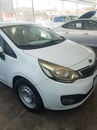 كيا ريو 2012 وارد خليجي محرك 1600 دوش تدفئة تبريد داخل اسود ومشمشي الس...