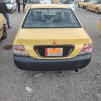 سيارة لانسر مسيو بوشي  للبيع موديل 2009 نضام غاز& بانزين تدفئه تبريد ش...