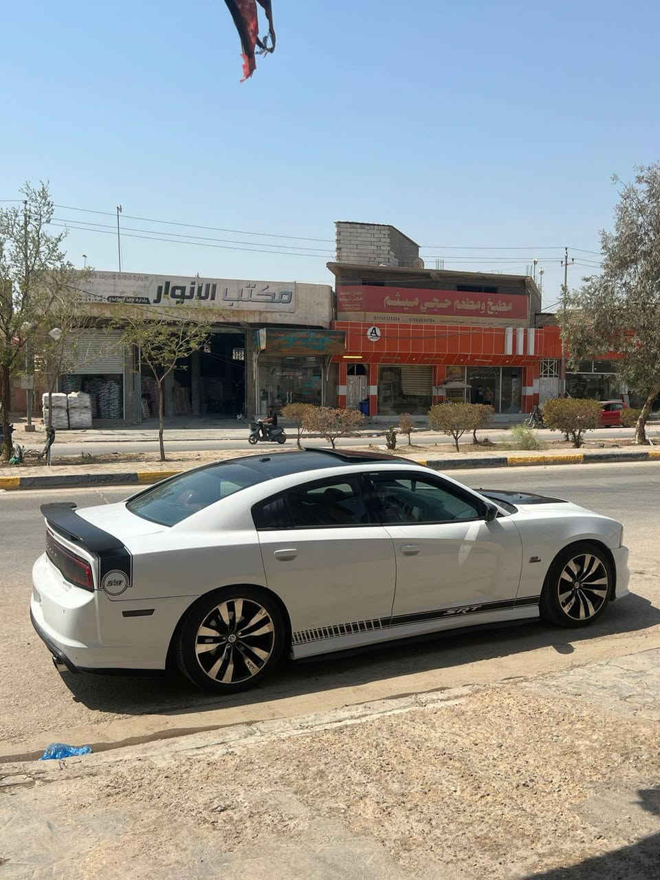 جارجر ارتي ماكس 2013 فول مواصفات السياره حادثها جاملغ خلفي وهنا بيها 3قطع رش بدون ايرباك بجم كبس ماشيه 120

.فتحه 
.شاشه كبيره
.تشغيل عن بعد 
.كشنات حضن وكهرباء احمر بلادي
.تدفئه تبريد كشنات 
.كلاصات حار بارد 
.دواسات وستيرن كهرباء 
.رادار امامي جانبي
.مري قلاب
.سستم صوت بيتس 
.خزن ميموري
.قماره اسود بلادي من امريكا 
.شفتات ستيرن 
     الاضافات 
.كت كامل srt 
كت لحايه ويل srt تايرات امامي 245خلفي 275
.داون بايب لايت ابو الحاجب وعين الشيطان 
.برمجه اون لاين السياره قويه كلش مكينه 5700 مكينه كير حداده كله تمام السياره نضيفه وجاهزه السعر 145 وبيها مجال بسيط *********** مكاني كربلاء
