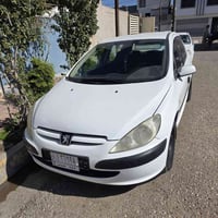 بيجو 307 • مشروع وطني • باب مبدل