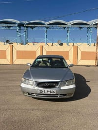 سياره ازيرا للبيع كامل مواصفات مقفوله موديل 2009 رقم 07865700932
