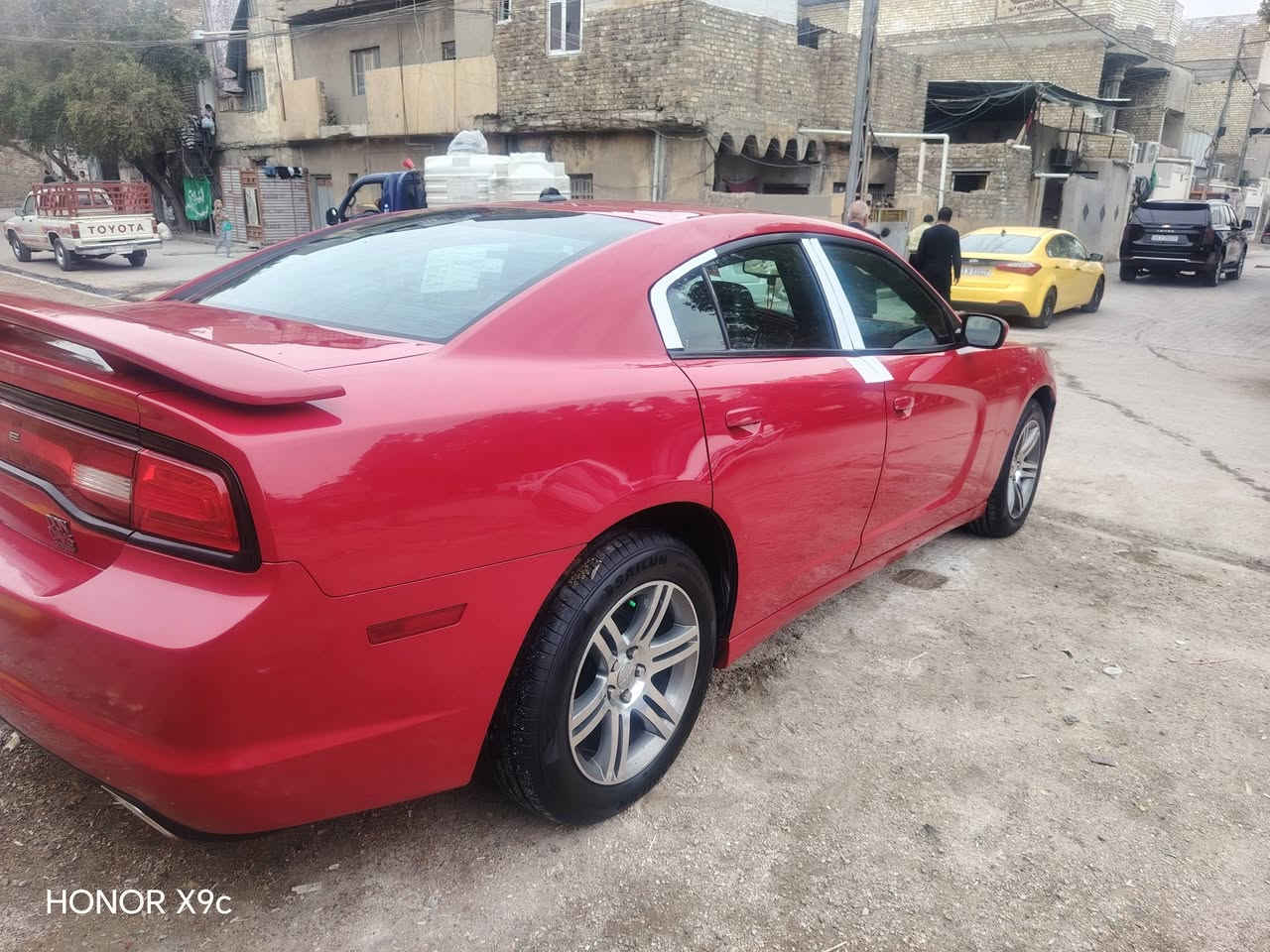 مكلف بالنشر جارجر موديل 2013 رقم بغداد وارد امريكي بيه صبغ بالجاملغ الخلفي  فقط السياره جاهزه من جميع    نواحي كير مكينه تبريد حداديه  السياره ممشتغله ع خط السعر ١٥٥ الاتصال ***********
