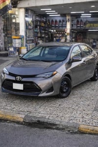 Toyota Corolla 2018 LE للبيع وارد مريكي  بيها ثلث قطع صبغ وشويه بارد ب...