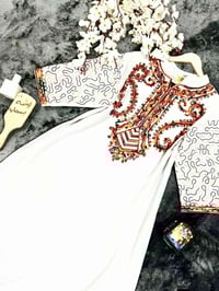 ملابس • نص درزن • آخر