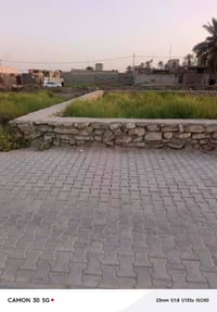 خلف الملعب القديم • شارع ابو مهدي المهندس • ٢٠٠م