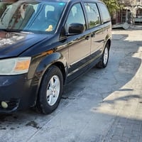 دوج كرفان ٢٠٠٩ محرك ٣٨٠٠ كشن السائق كهرباء  دوسات البريك كهرباء  أبواب...