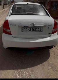 سيارة اكسنت 2011 منغولي  مكينة مكفول كير مكفول  صدر جديد  شاشة تحكم  م...