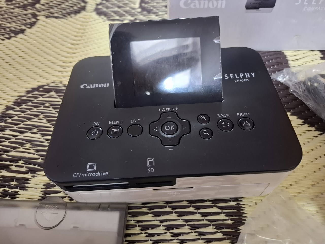 طابعة 🖨 كانون حجم 1000 صور معاملات بعدهي جديدة هيه وحبره ورقه اصلي ما فتوح مثل ما جاي شوف  اطيك بيه ظمان شغل سعرة (125)الف الاتصال [***********]
