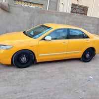 كامري موديل 8خليجي محرك 2400اعلى فئه Glx مصفره هيئه وغرامات مداور ثاني...