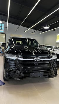 بلاك اديشن • GXR لمتد • داخلية جلد أحمر