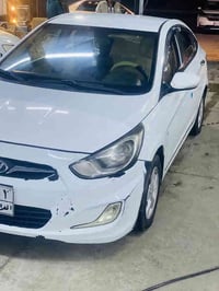 اكسنت • ٢٠١١ • ٢٠٠ ألف