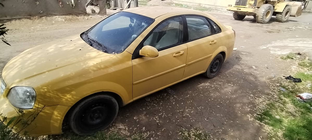 سلام عليكم وابتره موديل2012 سياره كامل من كلشي ماناقصه شي بس بيه جاملغ الخلفي فقط على البارد رقم بغداد مشروع وطني مصفره هيه السعر 62 مكاني بغداد هاذه رقمي ***********
