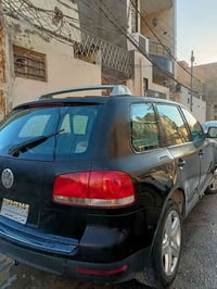 سياره البيع  موديل ٢٠٠٥ لون اسود سياره حلوه وسعره حلو رقم صلح الدين بس...