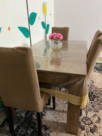 ميز طعام • ٩٠×١٤٥ • ٤ كراسي جلد