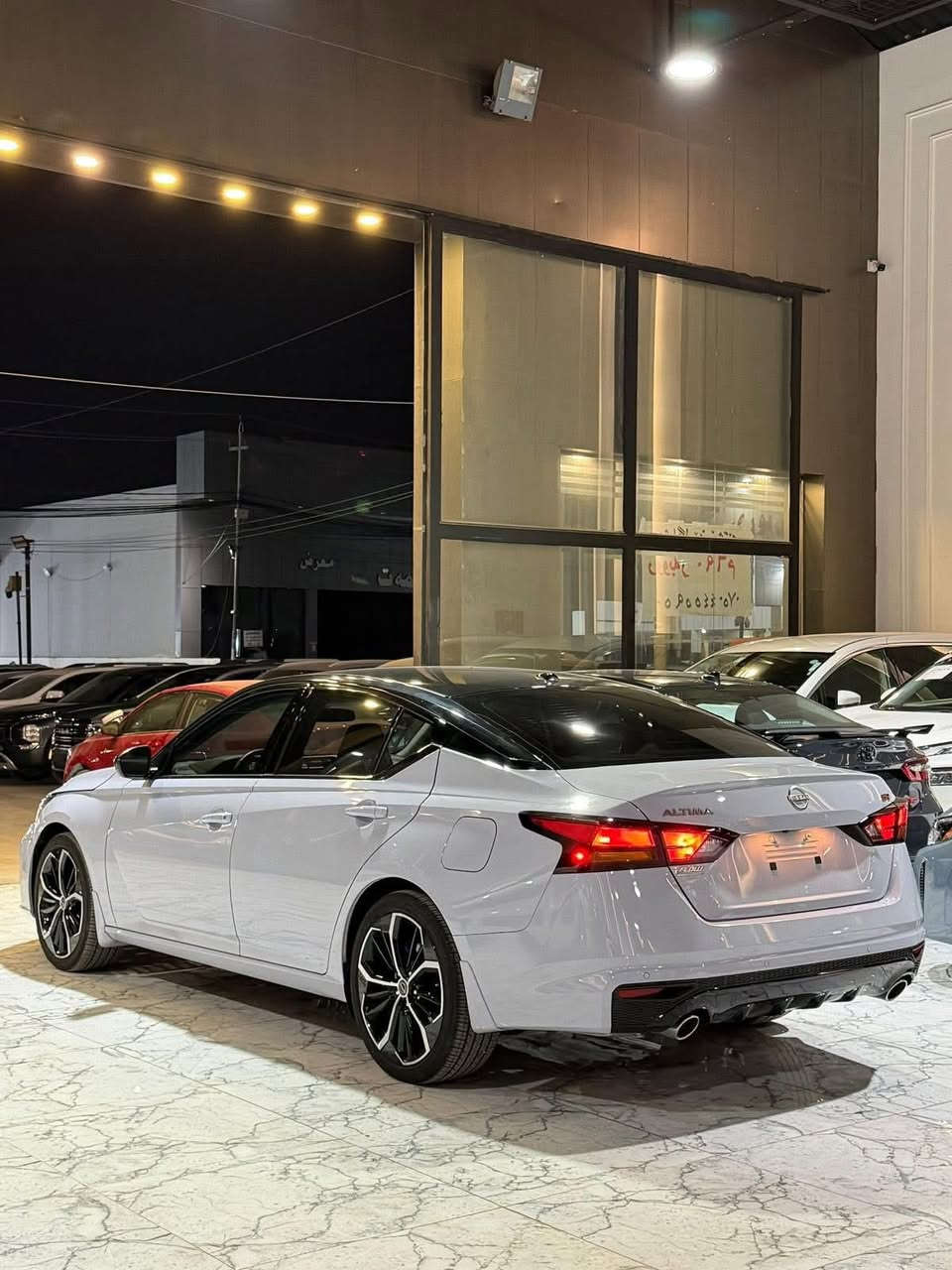 ‏Nissan Altima SR 2024
نيسان التيما 2024
عداد المسافة 4الف مايل
اللون : سمنتي (سموك) سقف اسود
ضرر :بابین صبغ بدون داخل
بجم و خلفي كبس ارباك ستیرن و دشبول سليم
المحرك : اربعة سلندر 2500

المواصفات SR
شحن واير ليس -
بصمة و بصمة ابواب-
تشغيل عن بعد-
رادار امامي تحديد مسار-
رادار خلفي-
رادار جانبي-
نقاط عمياء -
لايت زينون بلادي-
حساسات خلفي اوتو ستوب -
كشنات جلد + كهربائي + هيتر -
ستيرن تدفئه-
‏Apple car play +Usb+Aux
كامرة خلفية-
اشارة بالمري-
ويل كب -
دوسة ليد

‏‎‏‎ مکان سیارة اربیل 
‏‎‏‎سیارة بدون رقم تترقم شمالي 
‏‎‏‎‏‎للاتصال والاستفسار
‏‎اسیاسیل ***********☎️
☎️کورك ***********
